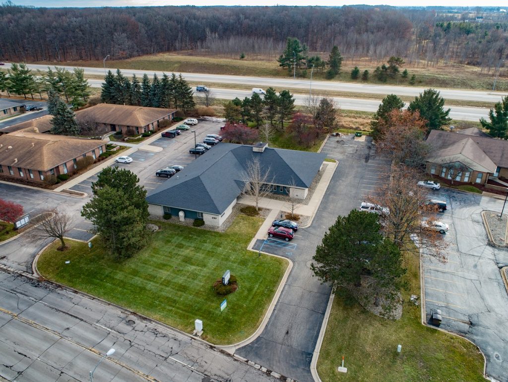 Woodworth Commercial, LLC Mid Michigan Roots, Global Reach